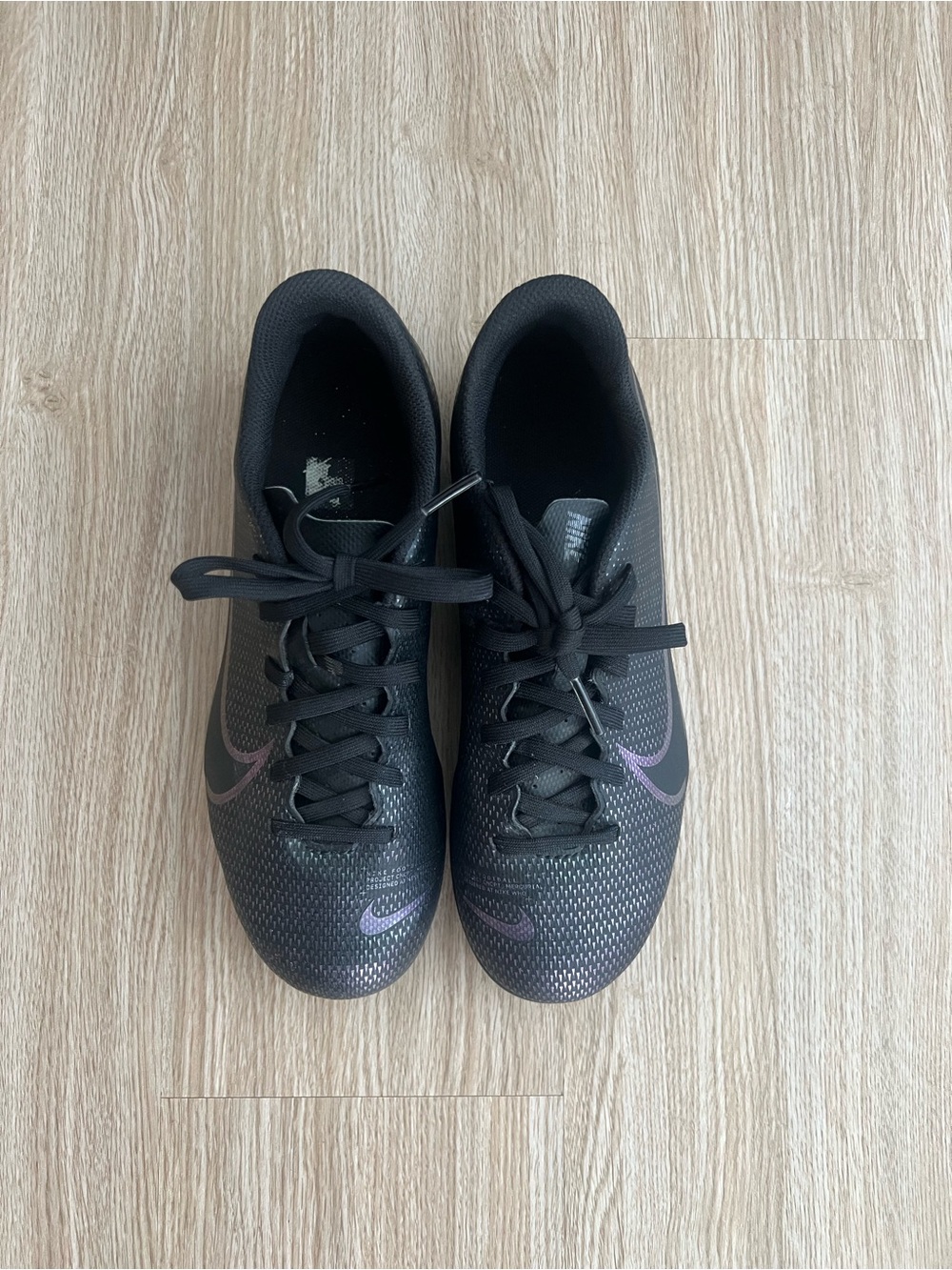 Nike Black Sneakers with Purple Swoosh Accents
